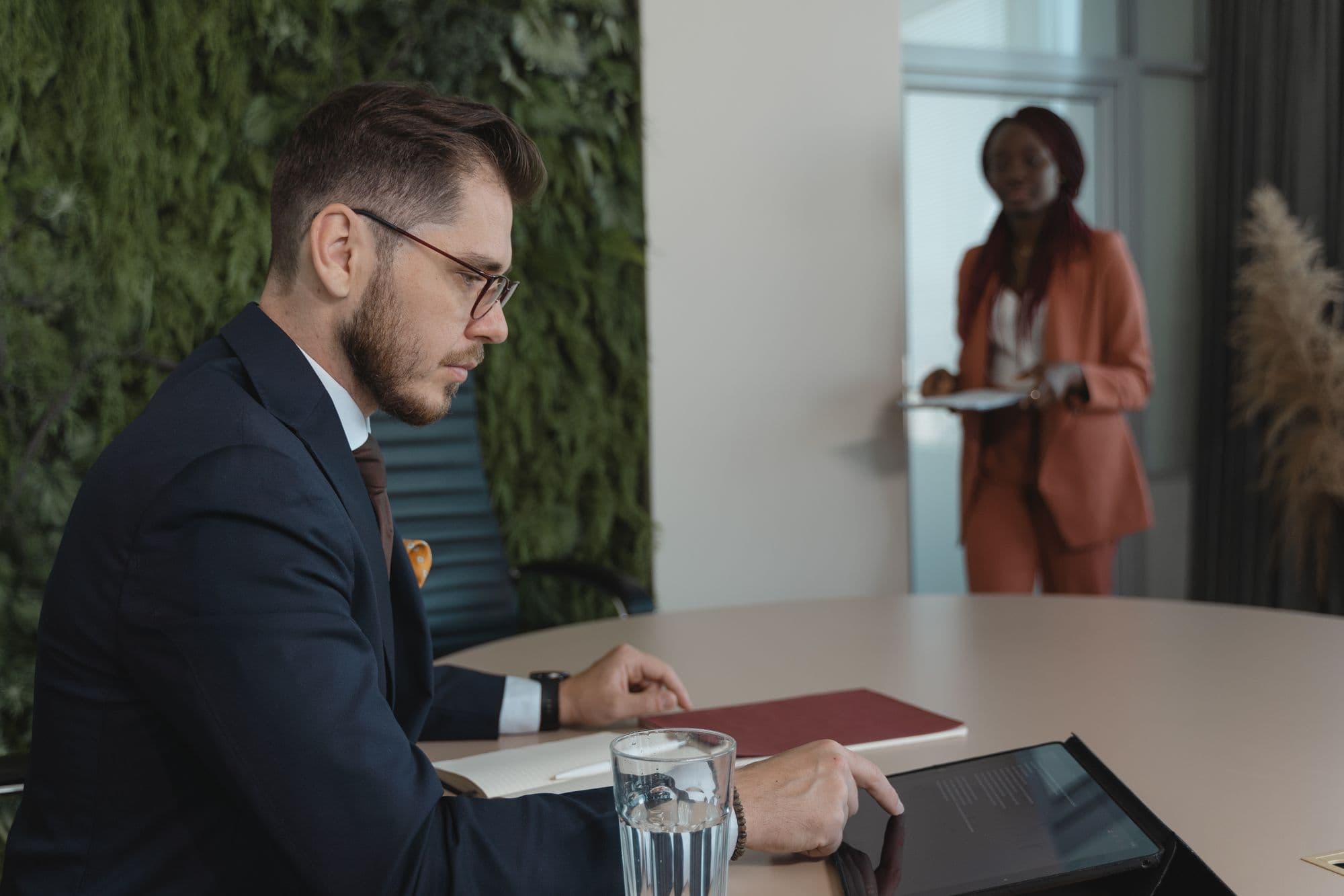 Business leader reviewing a Geonix dashboard on a tablet